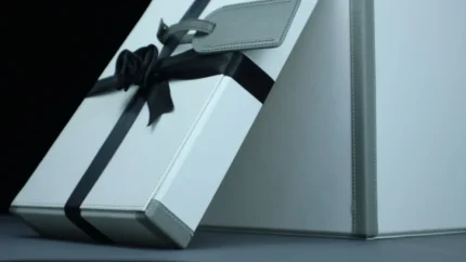 a white gift box dubai with a black ribbon